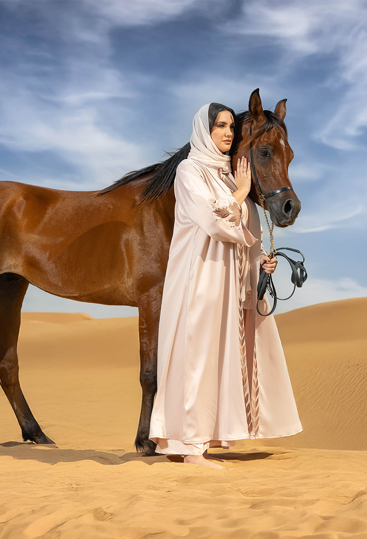 lady with a horse in desert